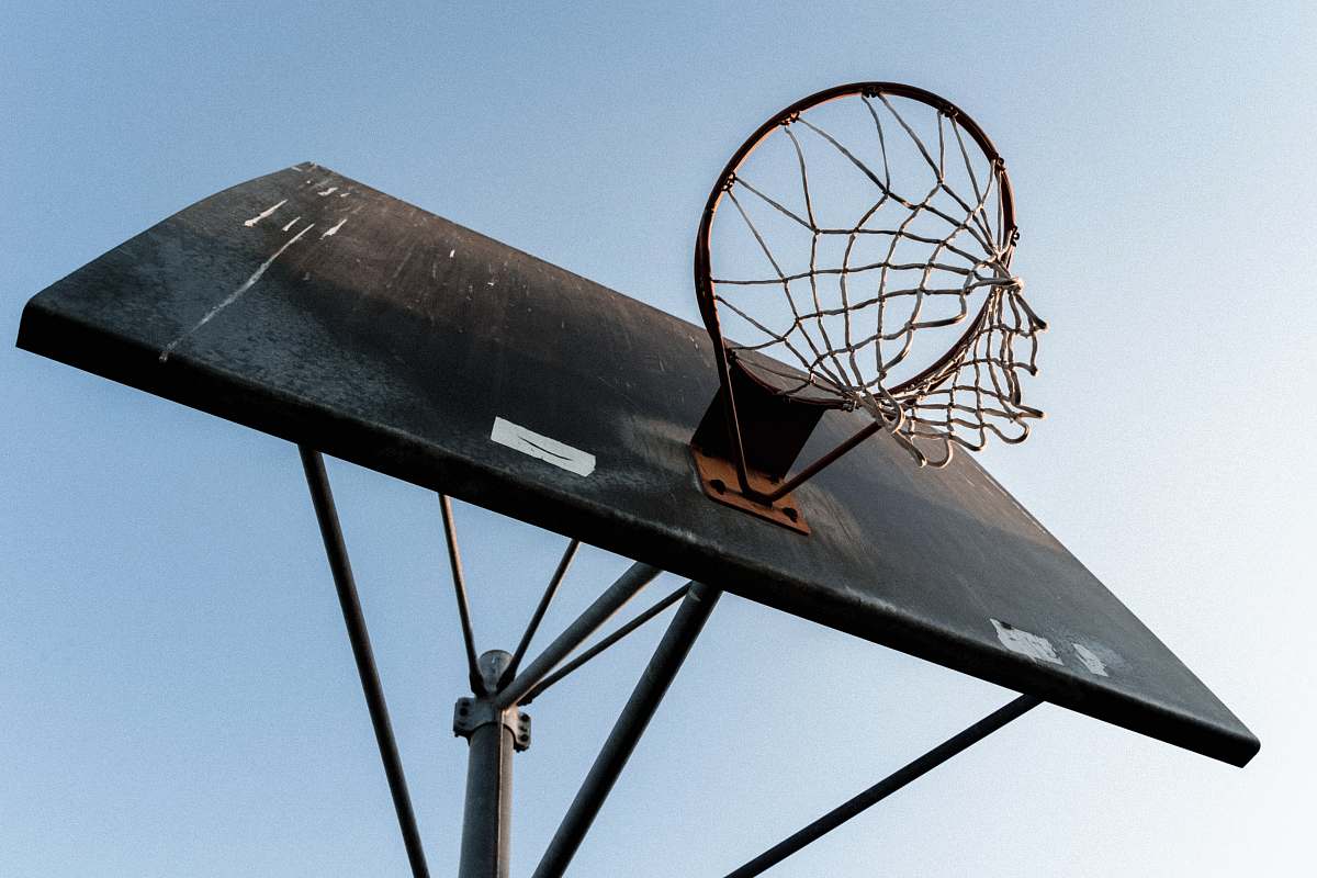 basketball court worm's eye view photography of basketball hoop sport